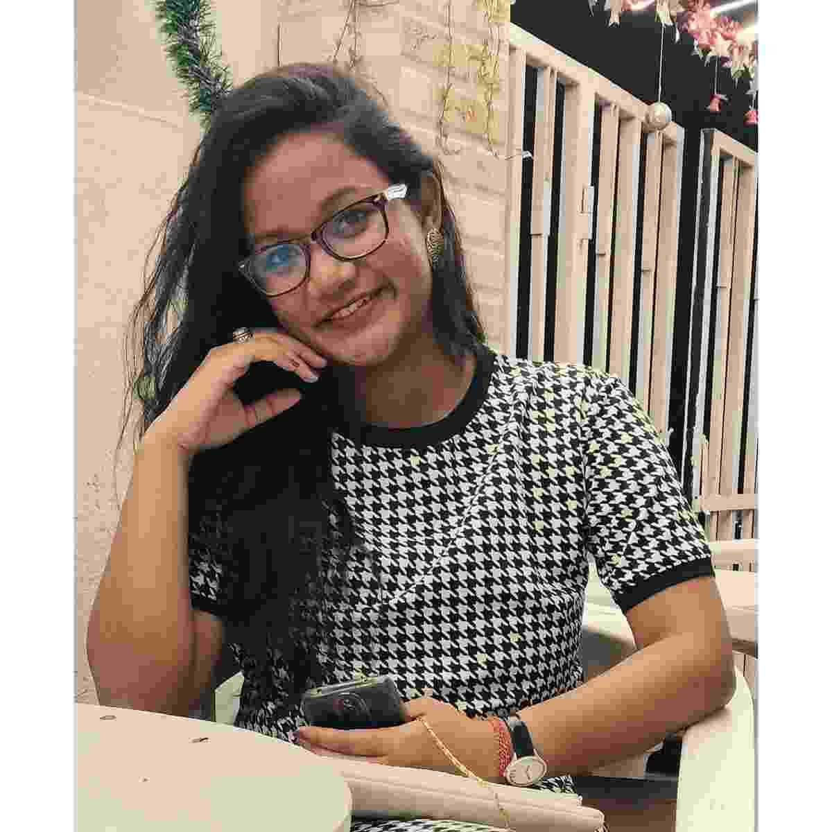 Mitisha Mukherji, Indian poet, Kolkata author, Shaat-Panch, Carols of Caroline, Bengali poetry, English poetry, young author, literary award winner, contemporary Indian literature, emotional poetry, women's journey, Granthana Publications, BS Production, Bookspot Publishers