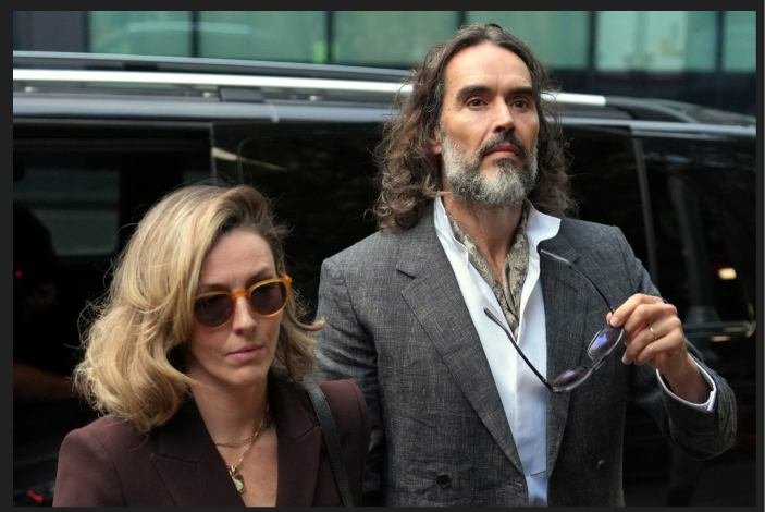Russell Brand arrives at Southwark Crown Court in London as his trial on seven criminal charges begins.